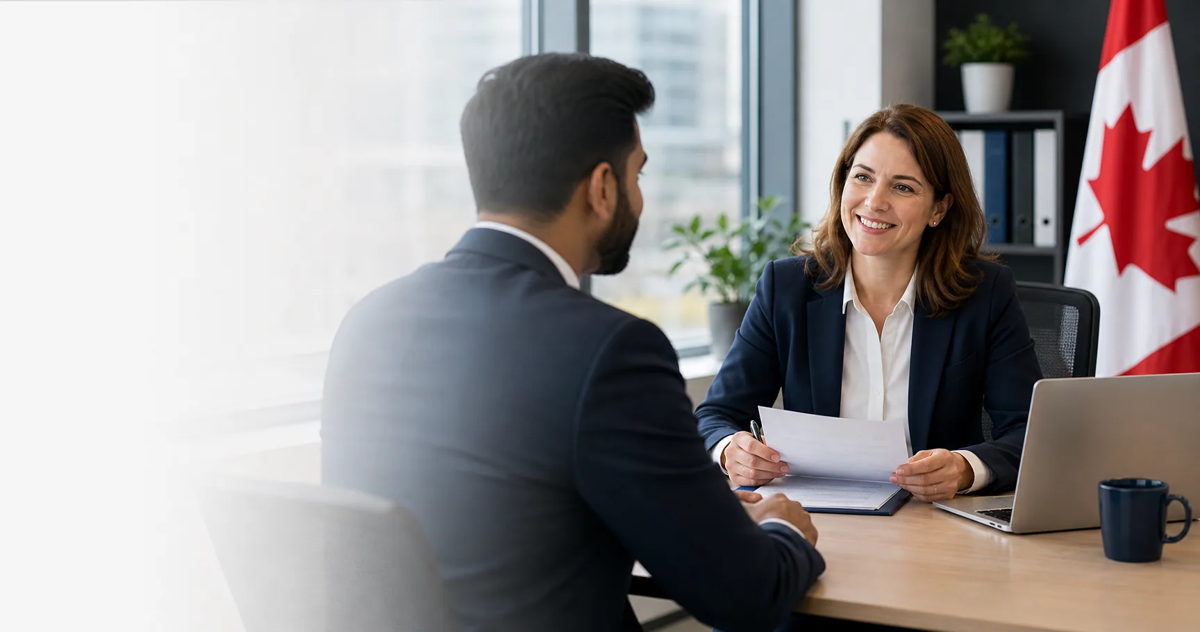 Canadian employer interviewing skilled worker for LMIA services